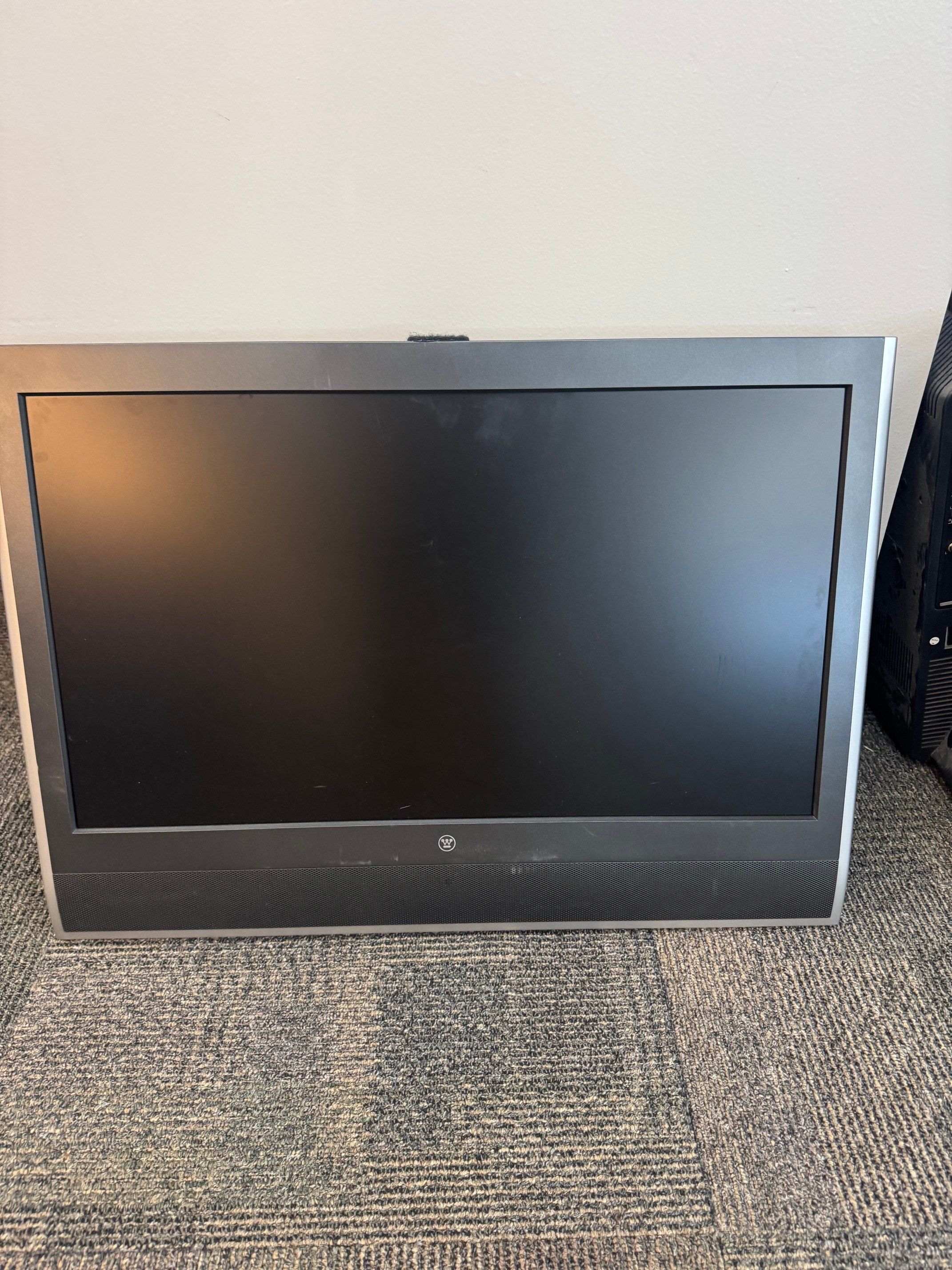 Westinghouse 32' LCD TV with power cord and remote.