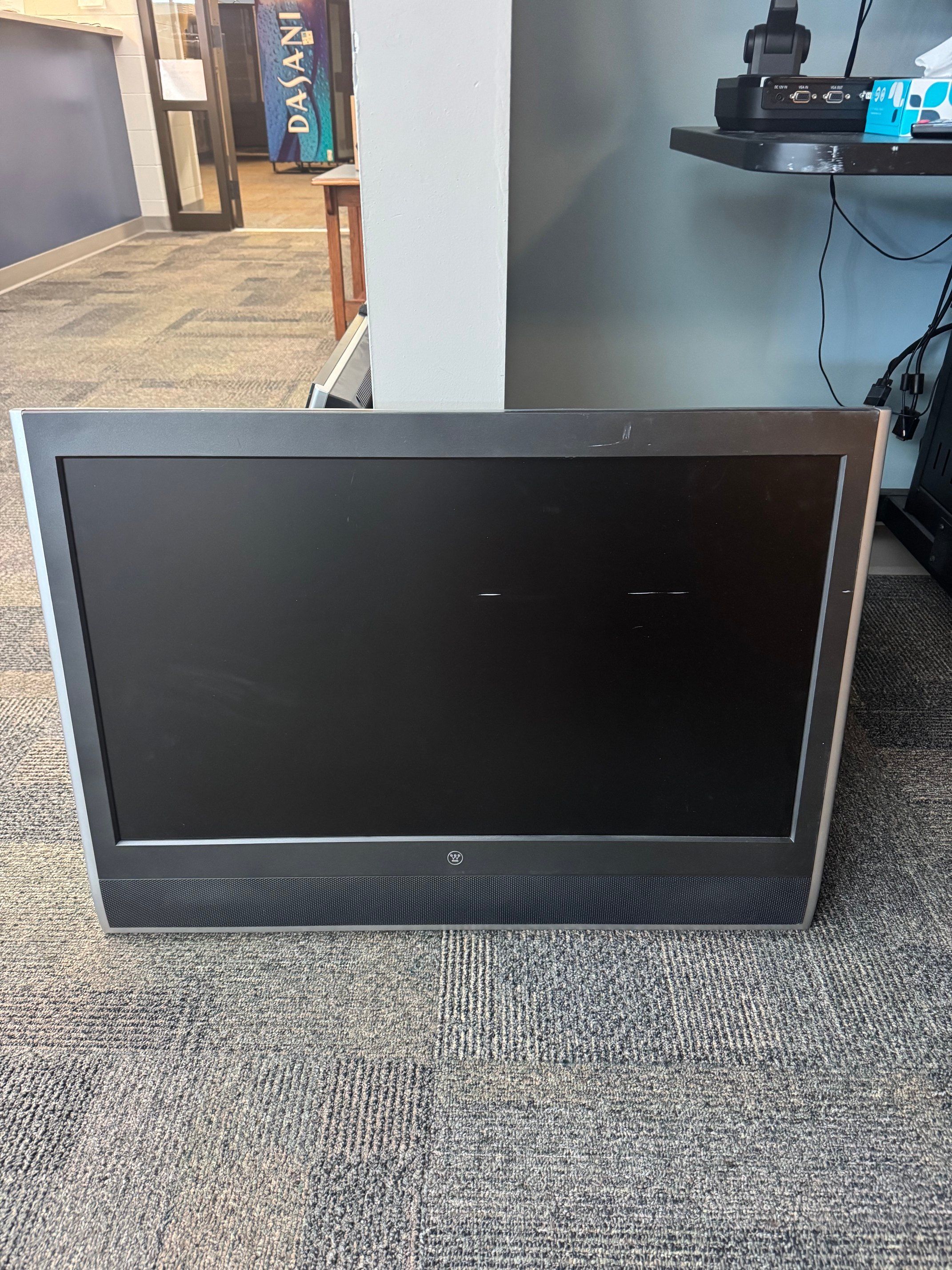 Westinghouse 32' LCD TV with power cord and remote.